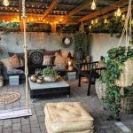 Picturesque outdoor patio with cosy furnishings and plants